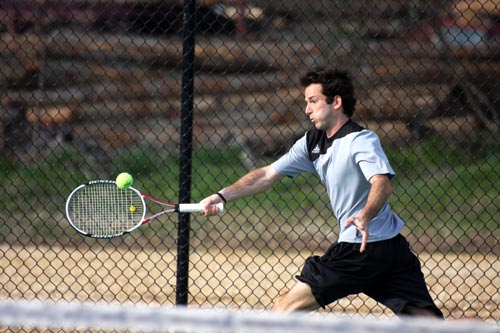 Arnaud Bichon extends for a return in his match against #15 Benedictine College.  He won a tie-break 7-6, 1-6, 10-5.